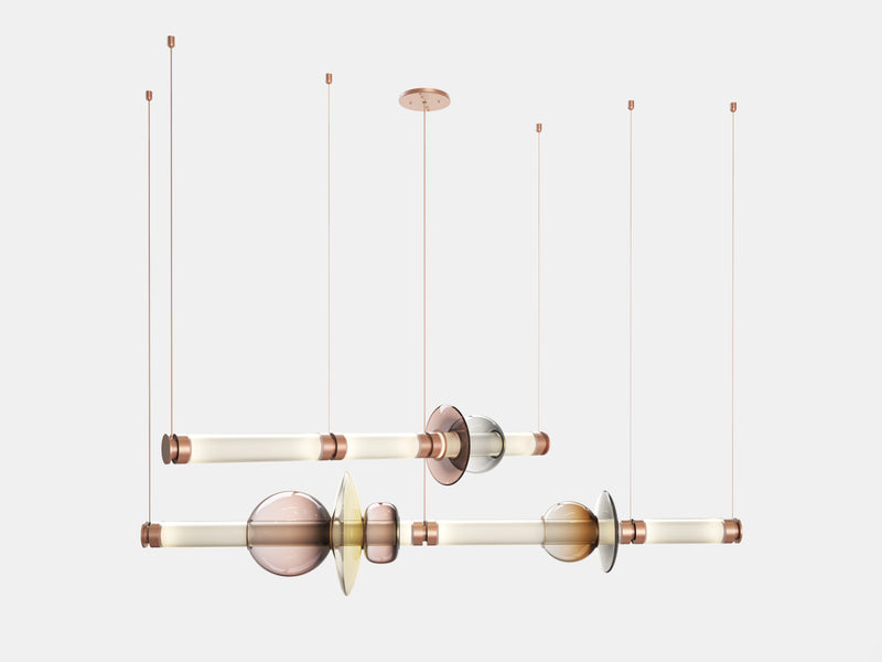 The Luna Chandelier 2-tier is a modern glass chandelier and a perfect statement piece for anywhere within the home or hospitality space. An opportunity to create a unique and enticing lighting solution, as it encompasses a modular design format, this light is customisable to your choices to create a bespoke chandelier.