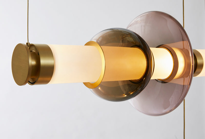 The Luna Chandelier 2-tier is a modern glass chandelier and a perfect statement piece for anywhere within the home or hospitality space. An opportunity to create a unique and enticing lighting solution, as it encompasses a modular design format, this light is customisable to your choices to create a bespoke chandelier.