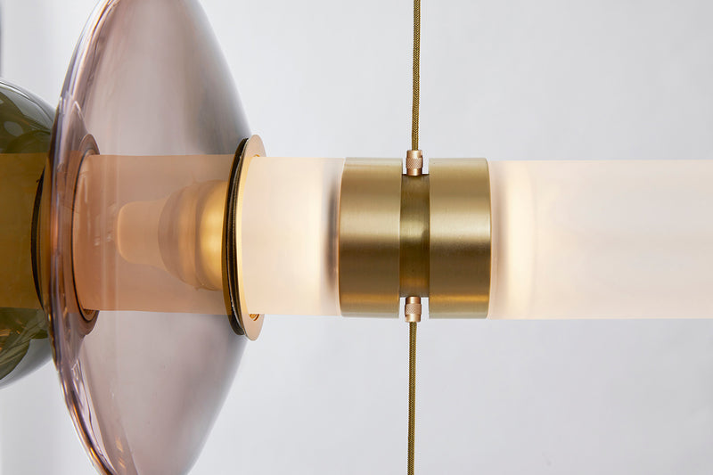 The Luna Chandelier 2-tier is a modern glass chandelier and a perfect statement piece for anywhere within the home or hospitality space. An opportunity to create a unique and enticing lighting solution, as it encompasses a modular design format, this light is customisable to your choices to create a bespoke chandelier.