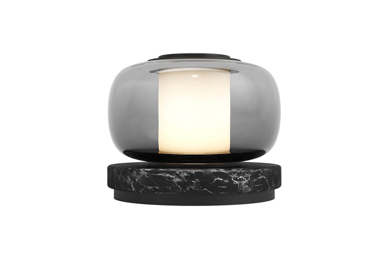 A high end desk lamp created with a sophisticated mix of glass and stone, the Luna A desk lamp stands out by the softness of its shapes and lines and is controlled by an elegant inline dimmer. The Luna A desk lamp by contemporary designer, Gabriel Scott, is the perfect desk lamp for a high end private office.