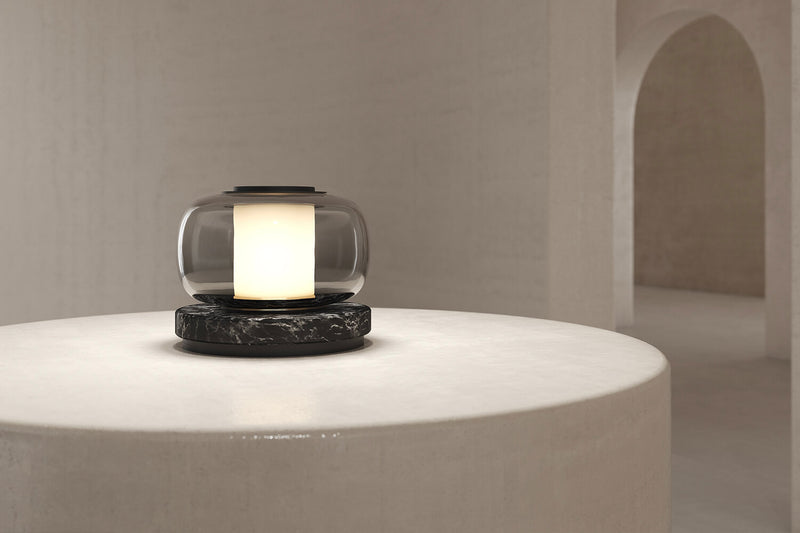 A high end desk lamp created with a sophisticated mix of glass and stone, the Luna A desk lamp stands out by the softness of its shapes and lines and is controlled by an elegant inline dimmer. The Luna A desk lamp by contemporary designer, Gabriel Scott, is the perfect desk lamp for a high end private office.
