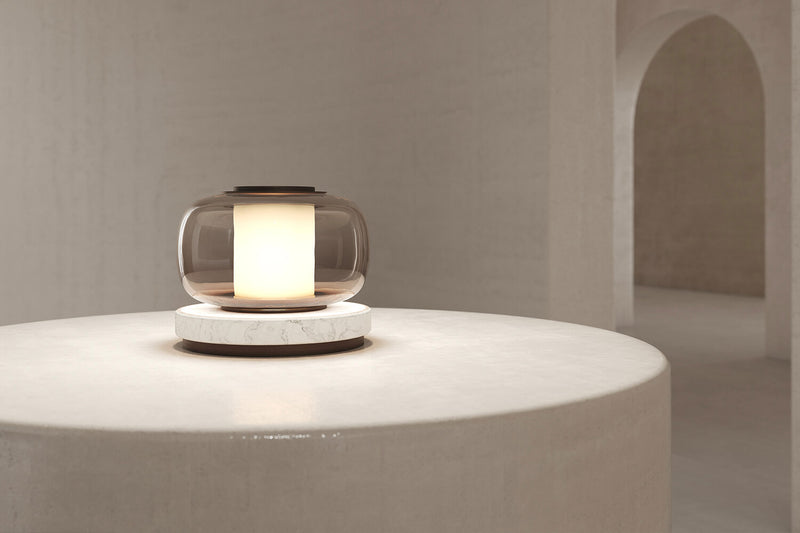A high end desk lamp created with a sophisticated mix of glass and stone, the Luna A desk lamp stands out by the softness of its shapes and lines and is controlled by an elegant inline dimmer. The Luna A desk lamp by contemporary designer, Gabriel Scott, is the perfect desk lamp for a high end private office.