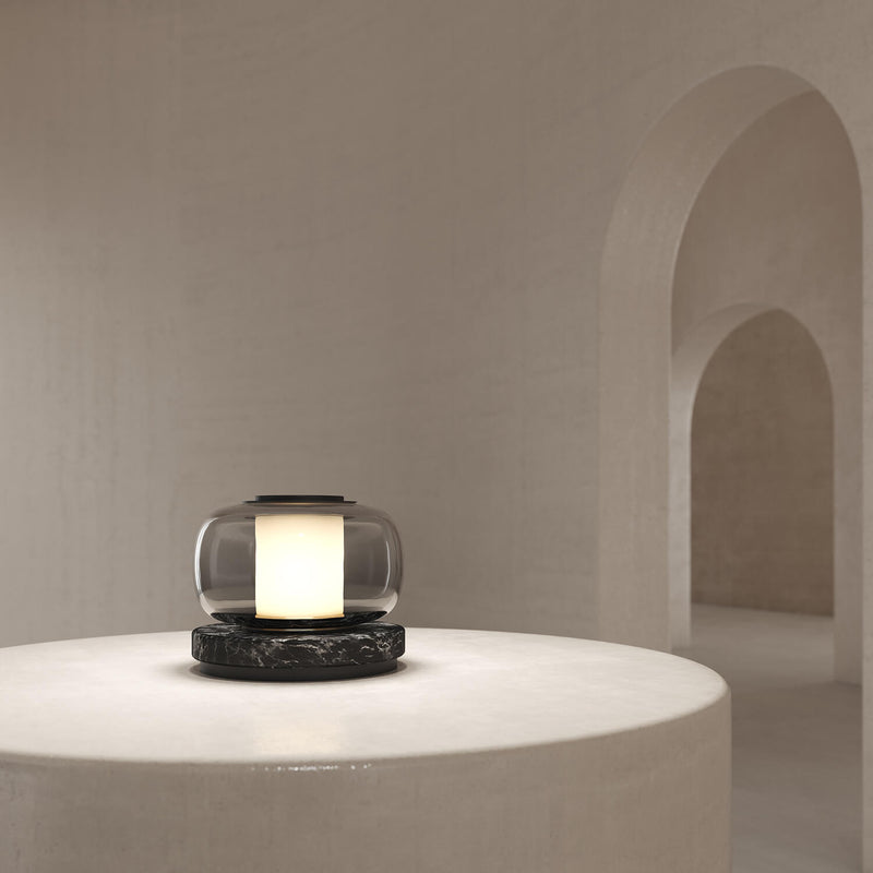 A high end desk lamp created with a sophisticated mix of glass and stone, the Luna A desk lamp stands out by the softness of its shapes and lines and is controlled by an elegant inline dimmer. The Luna A desk lamp by contemporary designer, Gabriel Scott, is the perfect desk lamp for a high end private office.