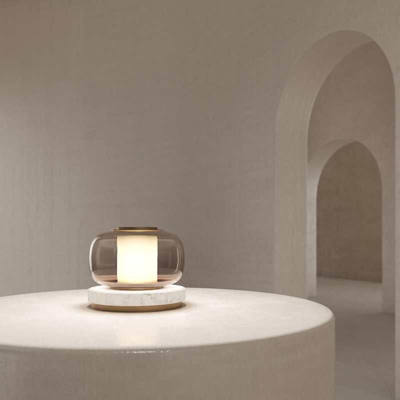 A high end desk lamp created with a sophisticated mix of glass and stone, the Luna A desk lamp stands out by the softness of its shapes and lines and is controlled by an elegant inline dimmer. The Luna A desk lamp by contemporary designer, Gabriel Scott, is the perfect desk lamp for a high end private office.