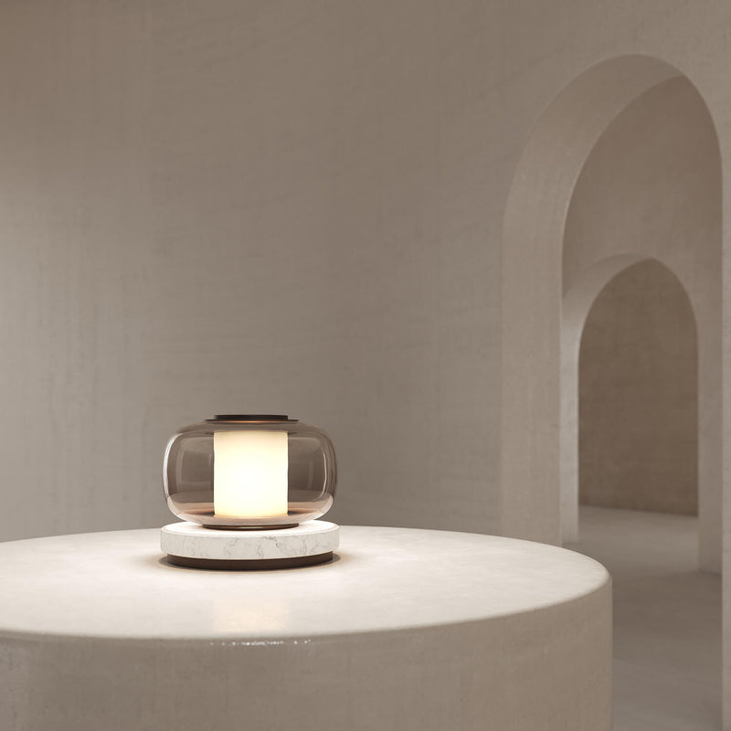 A high end desk lamp created with a sophisticated mix of glass and stone, the Luna A desk lamp stands out by the softness of its shapes and lines and is controlled by an elegant inline dimmer. The Luna A desk lamp by contemporary designer, Gabriel Scott, is the perfect desk lamp for a high end private office.