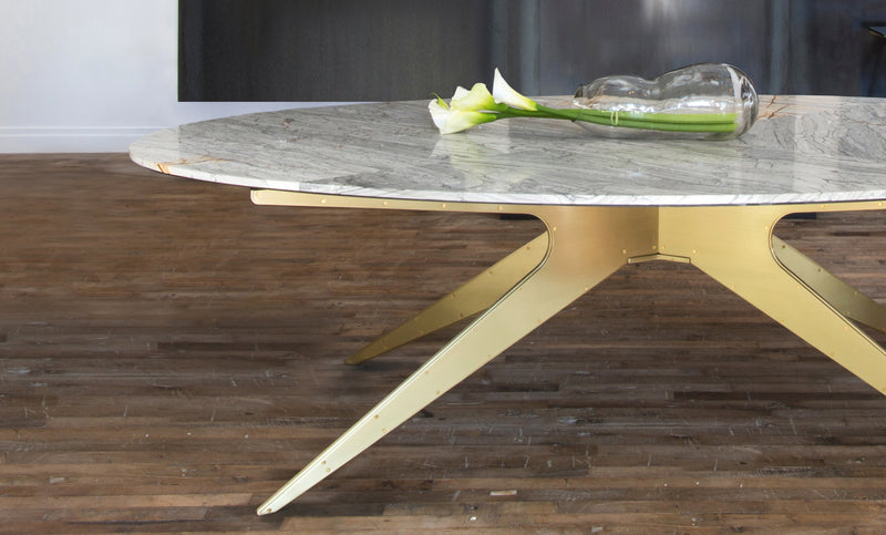 Showcasing contemporary industrial design met with elegant lines, the DEAN Dining Table features Italian and Turkish marbles set atop its layered metallic legs.