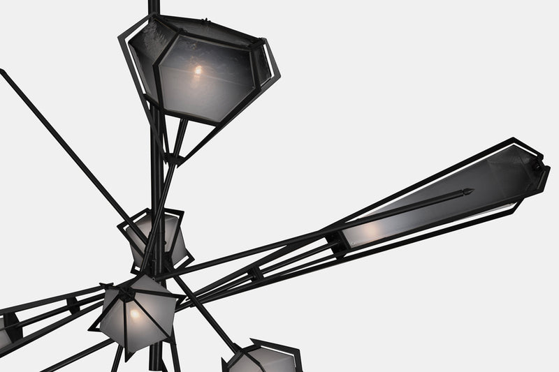 A veritable showstopper, the Harlow Large Chandelier offers luxury in an elegant starburst of light that reflects and refracts through its mold-blown glass shade. Not only designed as a contemporary steel chandelier this made-to-order lighting fixture is also available in bronze, copper, nickel and brass.