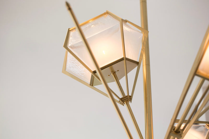 A veritable showstopper, the Harlow Large Chandelier offers luxury in an elegant starburst of light that reflects and refracts through its mold-blown glass shade. Not only designed as a contemporary steel chandelier this made-to-order lighting fixture is also available in bronze, copper, nickel and brass.