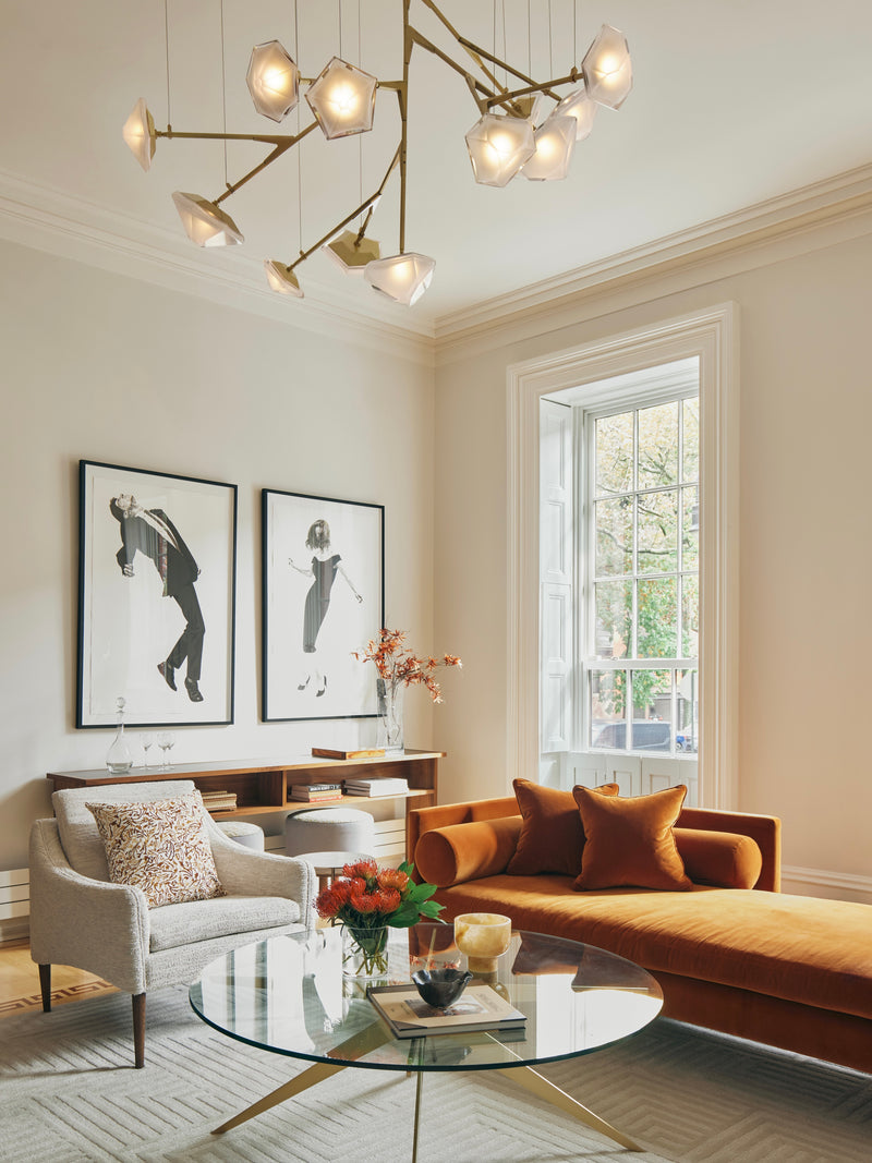 Bring mid-century style home with the Dean coffee table from Gabriel Scott. Industrial in design with elegant lines, it features a sleek, rounded glass tabletop with the brand’s signature black and brass finishes.