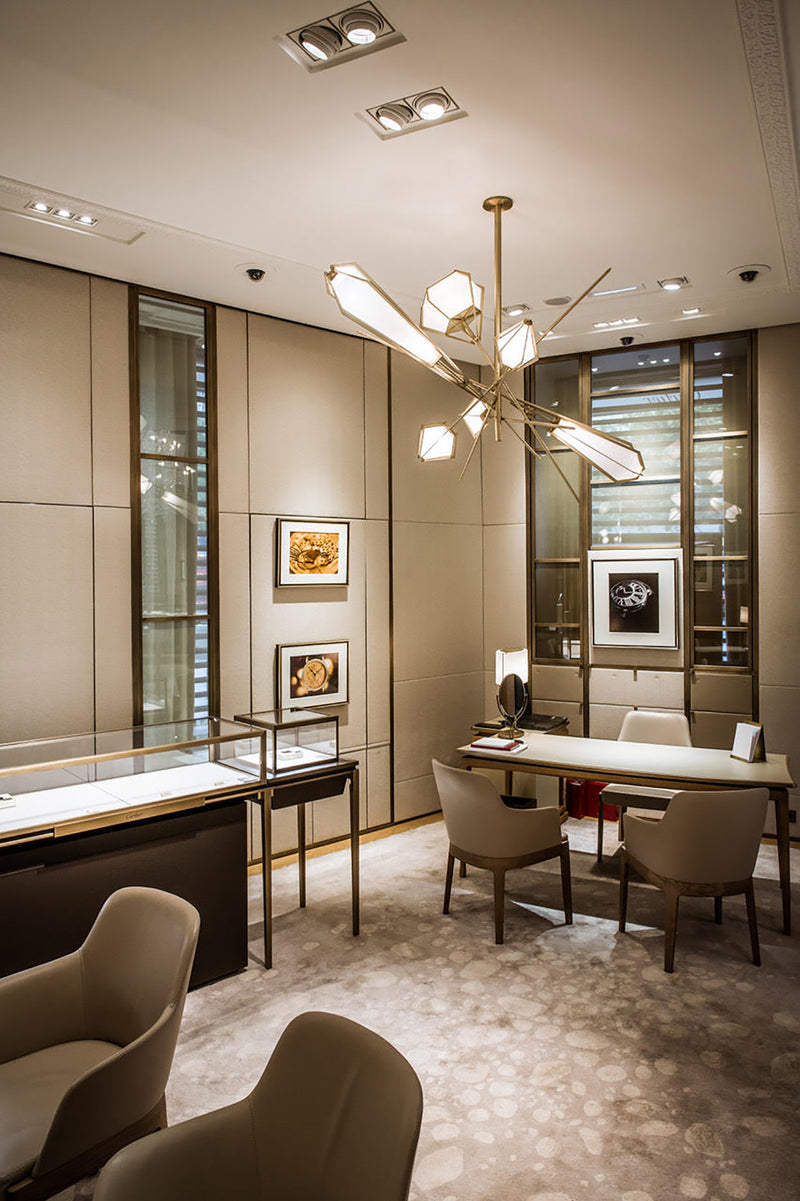 The Harlow Chandelier is directly inspired by the world of jewelry with its metallic frame encasing a translucent glass adding a touch of glamor to any residential or hospitality space.