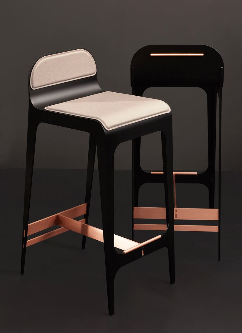 The Bardot Counterstool is finished with a vegan leather seat and metal hardware and designed by Gabriel Scott for sitting at counter top level.