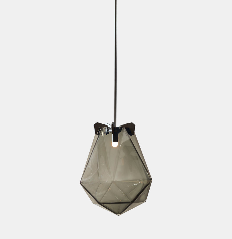 A powerful warm light diffused through double-blown glass, the BRIOLETTE showcases striking prismatic contours held by metallic prongs. This handmade glass pendant lighting by contemporary lighting designer, Gabriel Scott is a perfect addition to modern interior design.