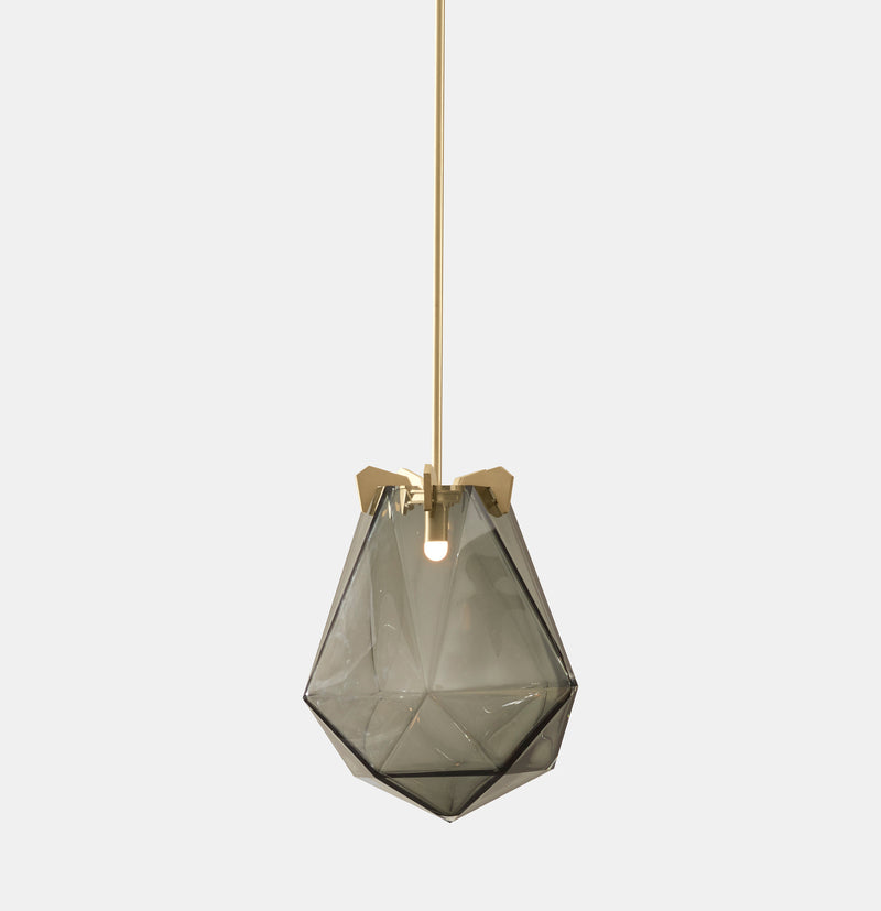 A powerful warm light diffused through double-blown glass, the BRIOLETTE showcases striking prismatic contours held by metallic prongs. This handmade glass pendant lighting by contemporary lighting designer, Gabriel Scott is a perfect addition to modern interior design.