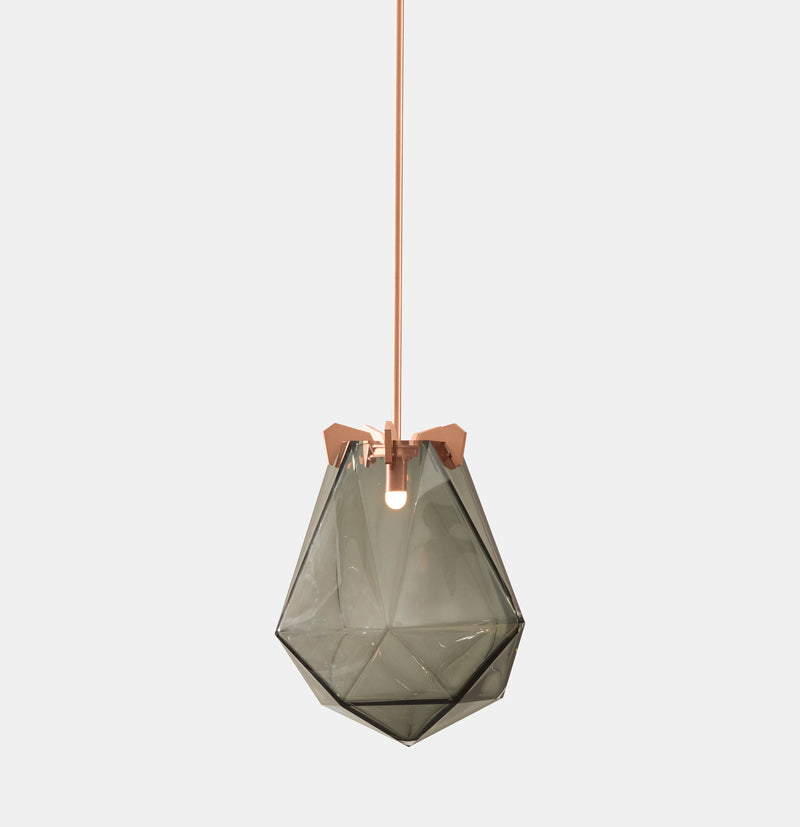 A powerful warm light diffused through double-blown glass, the BRIOLETTE showcases striking prismatic contours held by metallic prongs. This handmade glass pendant lighting by contemporary lighting designer, Gabriel Scott is a perfect addition to modern interior design.
