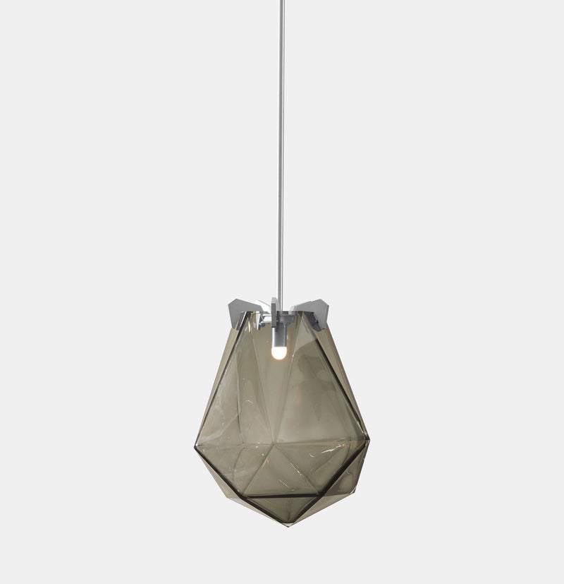 A powerful warm light diffused through double-blown glass, the BRIOLETTE showcases striking prismatic contours held by metallic prongs. This handmade glass pendant lighting by contemporary lighting designer, Gabriel Scott is a perfect addition to modern interior design.