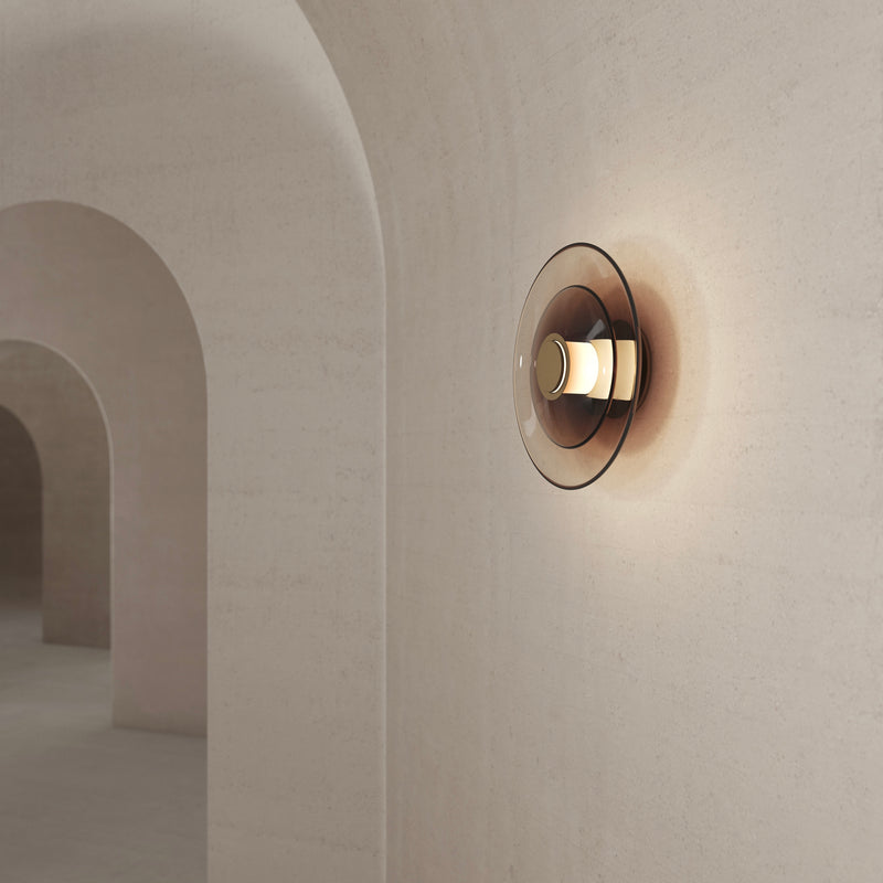 A contemporary lighting fixture, the Luna A Disc Sconce interplays between full and half-full shapes to create a modern wall feature which mimics the moon’s silhouette. This handmade sconce lighting is the perfect wall lighting for high end interior design and provides luxury wall lighting for the bedroom.