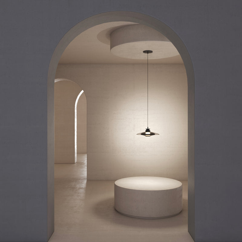 A soft interplay between full and half-full shapes, the Luna A Disc Pendant, by contemporary lighting designer, Gabriel Scott, brings out the elegance of the glass assembly. This handmade, made to order, modern, designer light will look good in your dining or living room or kitchen.